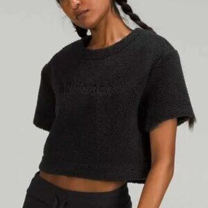 Lululemon Textured Fleece Embroidered Logo Tee Black Cropped Crew Neck Size: 4